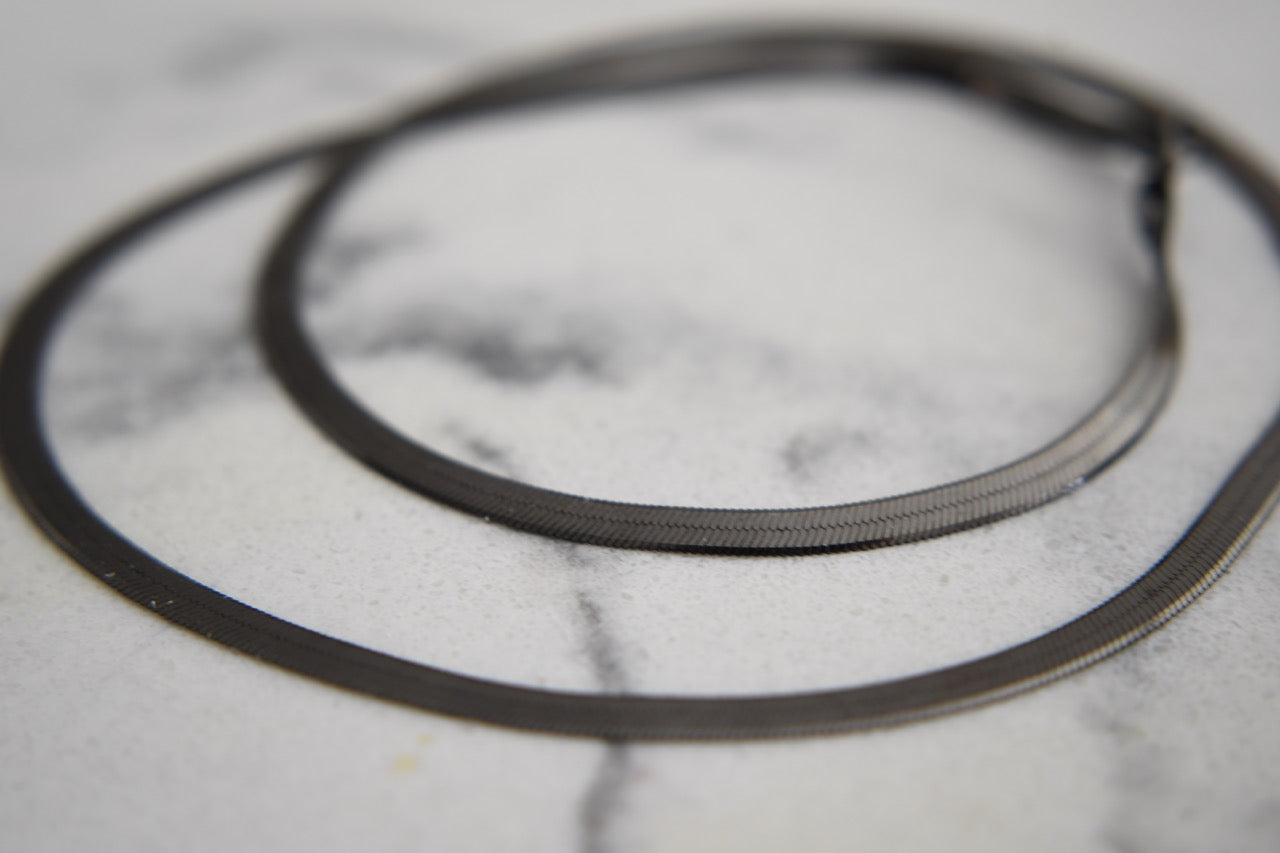Klo Herringbone Necklace in Black Gold