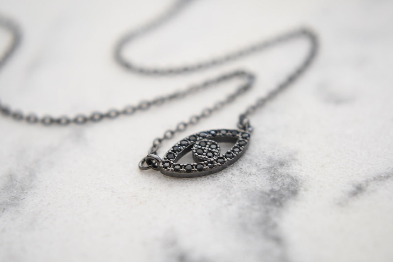 Lexi Mini Eye Necklace in Black Gold Plating