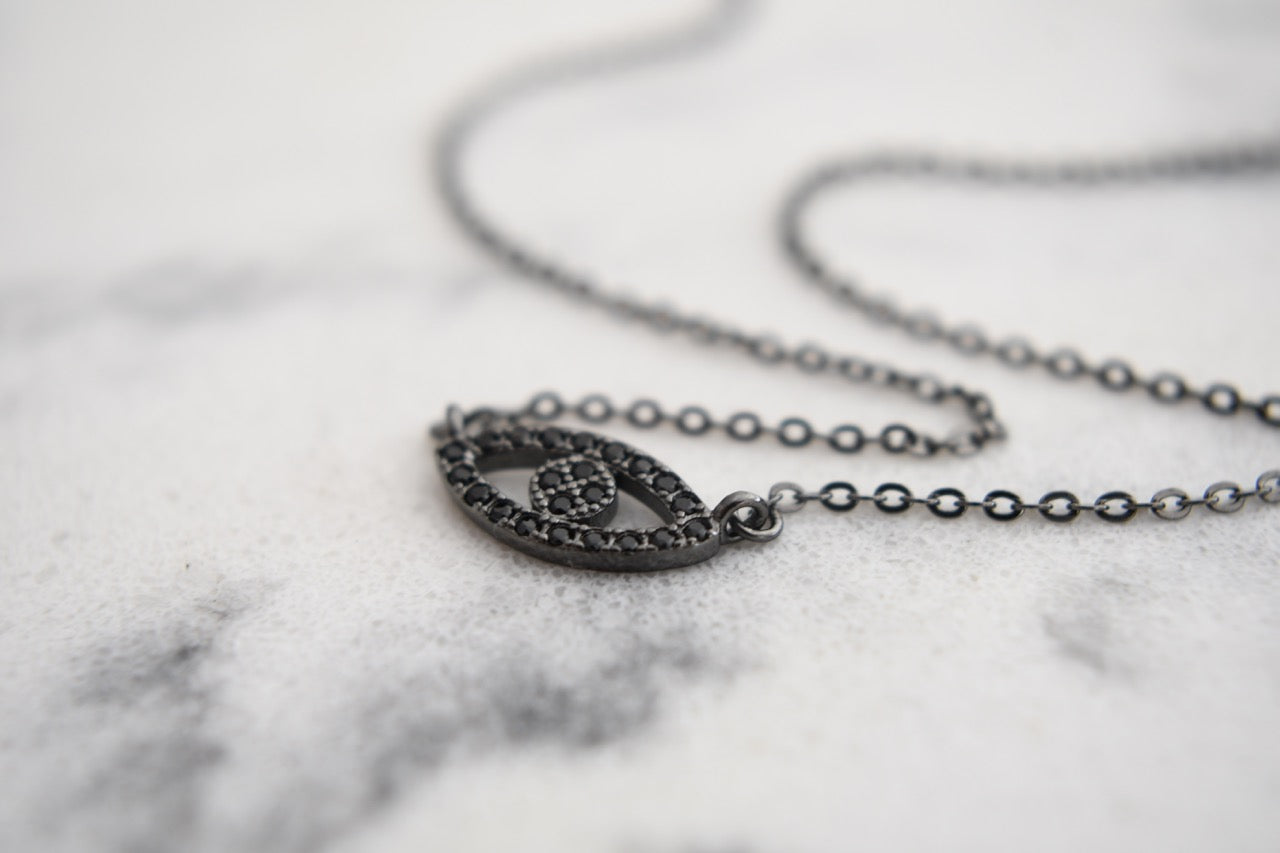Lexi Mini Eye Necklace in Black Gold Plating