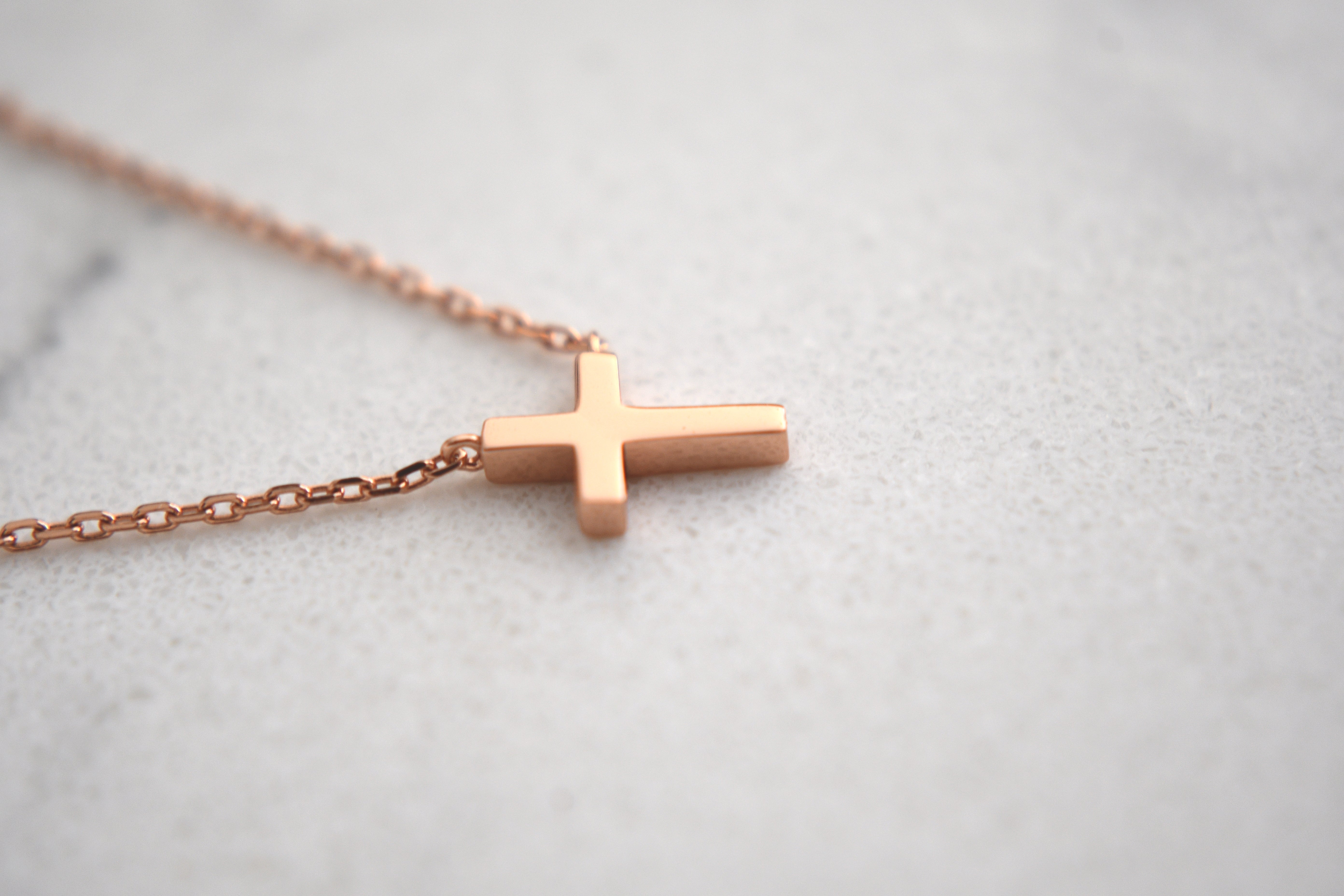 Jair Leaning Cross Necklace in Rose Gold Plating