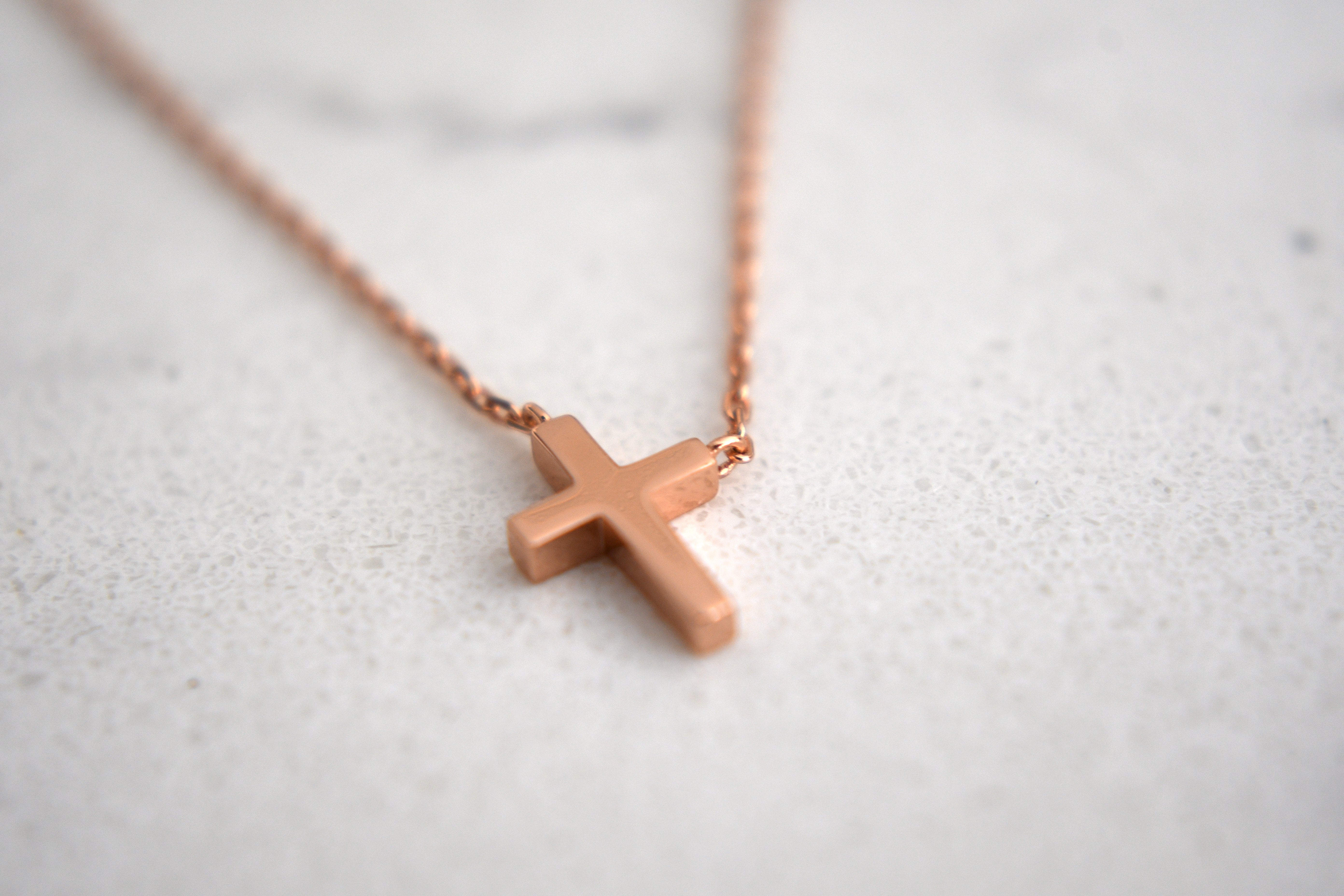 Jair Leaning Cross Necklace in Rose Gold Plating